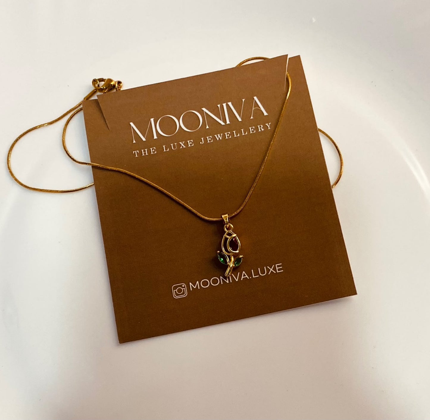 red rose gold pendant necklace